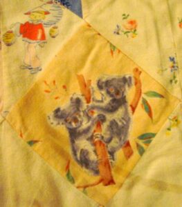 Koalas, Indonesian children with blonde hair, and the word ‘Pinkie’ in the baby quilt that Kitty made for Arnold.